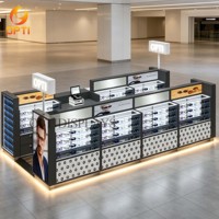 Vitrine d'exposition optique moderne pour centre commercial, présentoir lumineux pour lunettes de vue et de soleil, idéal pour l'aménagement de magasins d'optique