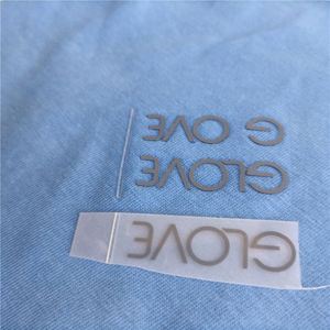 Étiquettes de vêtements en caoutchouc 3D personnalisées avec logo de marque en relief, durables, en silicone, à transfert thermique pour le plastique - Product Image 1