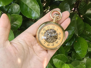 Montre de poche mécanique vintage en or jaune, boîtier rond, mouvement visible - Product Image 3