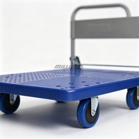 Chariot utilitaire à plateforme en plastique à quatre roues pour entrepôt, usine, commerce de détail et manutention de marchandises