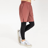Pantalon de sport 2 en 1 pour homme, couleur rouge brique, avec short extérieur et collants de compression intégrale, pour la gym, l'entraînement et la course à pied