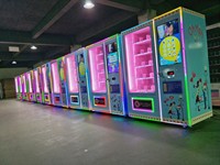 Distributeur automatique de boissons et de snacks réfrigéré en acier inoxydable à grande capacité avec écran tactile et gestion basée sur le cloud pour usage commercial