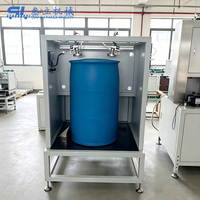 Machine de test de fuites d'air semi-automatique pour fûts en plastique vides de 200 L avec codage laser pour la production de fûts chimiques en PEHD