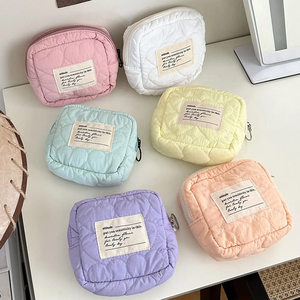 Vente en gros de mini sac multifonctionnel à fermeture éclair pour menstruations, sac de rangement pour serviettes hygiéniques, rembourré