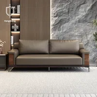 Ensemble canapé et table basse modulaires modernes avec cuir synthétique et éponge haute densité pour salon commercial