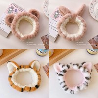 Vente en gros directe usine : Bandeau de spa unisexe en peluche fait main avec nœud, en flanelle corail douce, pour le lavage du visage et le maquillage, personnalisable