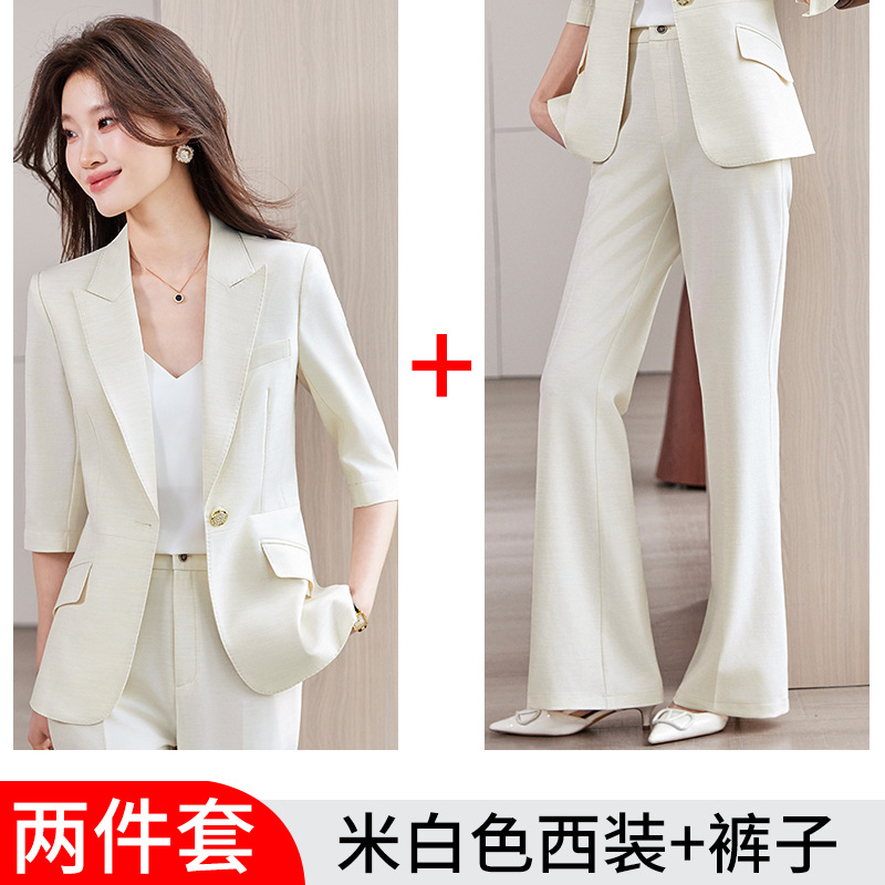 Off-white suit with slightly flared trousers
