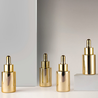 Flacon compte-gouttes en or personnalisable de luxe 30 ml 1 oz pour soins de la peau, emballage en verre avec bouchon compte-gouttes doré avec revêtement UV