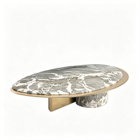 Table basse en marbre de forme elliptique libre, combinaison de cylindre en marbre et base en support doré, mobilier de salon de luxe de designer