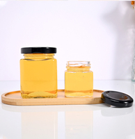 Pot à miel en verre transparent de qualité alimentaire de forme carrée classique avec couvercle à vis en fer blanc