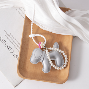 Nouveau porte-clés chien en cuir PU, motif chiot de dessin animé tissé multicolore, avec pendentif sac et décoration chaîne de perles, sérigraphié - Product Image 6