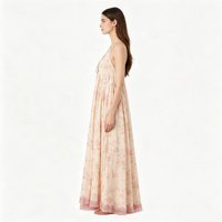Robe longue rose à fleurs avec col halter et nœud sur le devant pour femme, idéale pour l'été, la plage, les vacances, élégante, en mousseline fluide