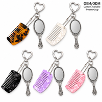 Newyeah Vente en gros Peigne en métal en forme de cœur vintage personnalisé OEM ODM et miroir de maquillage rétro 2-en-1 porte-clés pour femmes