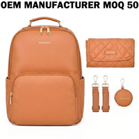 Sac à langer de maternité et de voyage grande capacité en cuir végétalien OEM pour femme avec matelas à langer intégré