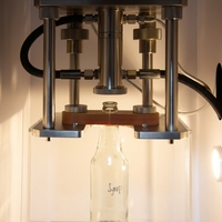 Sumspring High Accuracy Internal Pressure Tester for Glass Bottles with Touch Screen 1to 50 KN Measurement Range Laboratory Use