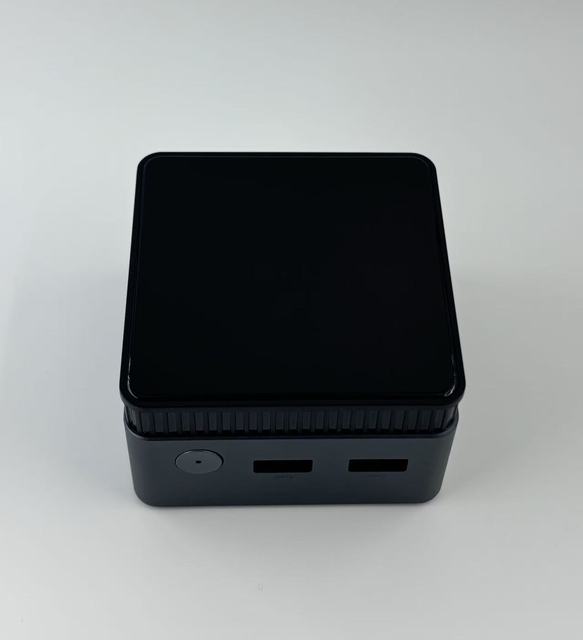 Portable Intel N150 Mini PC with 12GB RAM-Delivering Ultra-compact, Powerful Performance for Your Mobile Office Needs.