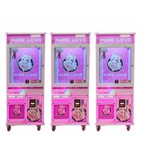 Machine de jeu d'arcade à monnayeur avec grue à griffes pour attraper les poupées