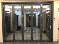AMJ Chine Fabrication et fourniture de portes pliantes insonorisées et isolées, portes pliantes en aluminium, portes patio pliantes en aluminium
