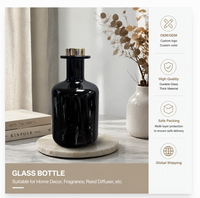 Diffuseur d'arômes pour la maison en verre rond de 500 ml avec compte-gouttes et impression sérigraphique