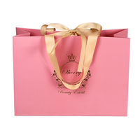 Sacs en papier couché de luxe OEM pour emballage cadeau de bijoux, réutilisables, avec impression de logo personnalisé, avec logo et nœud papillon