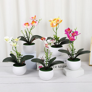 Orquídeas Phalaenopsis artificiales de Yiwu Datuo Florist, plantas decorativas en maceta de 18x24 cm para uso en interiores, hogar y oficina. - Product Image 1