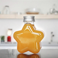 Bouteille vide en PET de qualité alimentaire de 50 ml (1,7 oz) en forme d'étoile créative pour thé, eau minérale, soda, jus, bonbons, avec bouchon