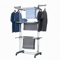 Organisateur de vêtements et séchoir à serviettes moderne en métal à quatre niveaux, pliable, télescopique et sur pied pour salle de bain et salon