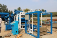 Machine Hydraulique Automatique QT4-15B pour Fabrication de Briques en Béton Creuses, Pavés et Briques Pleines Autobloquantes