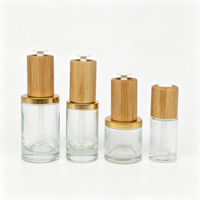 Emballage cosmétique vide en verre avec compte-gouttes en bambou OEM ODM pour sérum, huile essentielle et soins de la peau