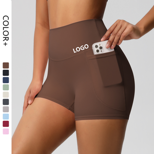 Shorts de yoga taille haute avec poches, sans coutures, couleur unie, en spandex et polyester, séchage rapide, logo sur la taille - Product Image 1
