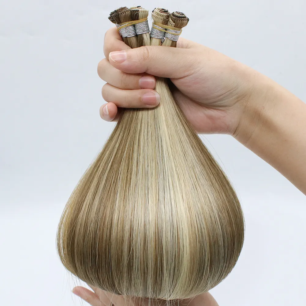 Extensión de cabello de trama atada a mano doble de cabello humano Remy ruso 100 de alta calidad