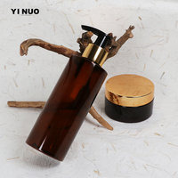 Pot et flacon en plastique PET ambré avec bouchon doré et pompe noire pour les soins de la peau, shampoing, crème, vente en gros d'usine, 50 ml, 150 g, 200 ml, 250 g