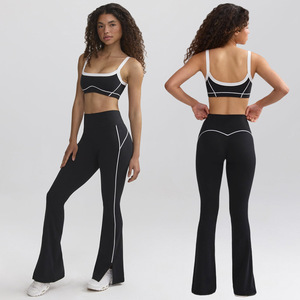 Completo Sportivo Traspirante Solido ad Alta Elasticità con Top a Contrasto e Pantaloni a Tromba Modellanti per Yoga e Fitness - Product Image 1