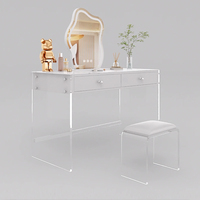 Table de maquillage moderne en acrylique blanc avec miroir sur pied transparent et tiroirs, idéale pour chambre à coucher et mobilier d'hôtel