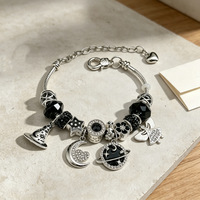 Bracelet Fanhua Jewelry, best-seller TikTok, en acier inoxydable plaqué or, imperméable, avec motif chapeau de sorcier, lune, Saturne et étoile.