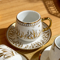 Desain Elegan Cangkir Teh Porselen Mewah Berlapis Emas 90cc Set Cangkir Kopi dan Piring Keramik 6 Buah untuk Hadiah Pernikahan