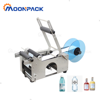 Machine d'étiquetage semi-automatique de bureau Moonpack MT-50S pour bouteilles rondes et étiquettes d'eau