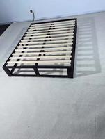 Lit pliant moderne chinois avec cadre en métal renforcé et rangement intégré pour chambre à coucher ou salon d'hôtel