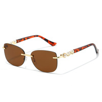 Lunettes de soleil sans monture à perles tendance pour femmes
