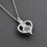 Urna Funeraria de Lujo de Acero Inoxidable Plateada con Colgante de Corazón de Cristal Ecológica