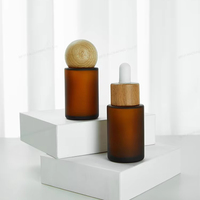 Bouteille en verre compte-gouttes de sérum de cylindre d'ambre givré bouteille vide de luxe de 50ml-pour le liquide d'oeil d'huiles essentielles avec le tube en verre