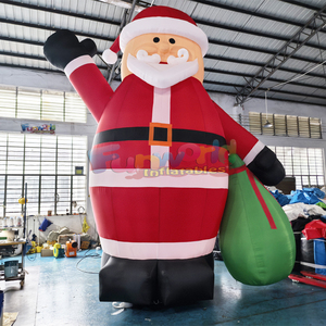 Décorations de Noël géantes gonflables pour l'extérieur, Père Noël géant tenant des cadeaux et une canne en sucre. - Product Image 5