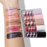 Gloss à lèvres de luxe végétalien à logo personnalisé, fini brillant, texture tourbillonnante unique, paillettes magiques, gloss nacré, fournisseurs de gloss à lèvres