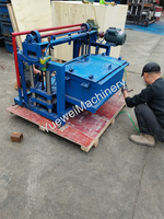 Machine de levage automatique Machine de fabrication de briques de ponte en béton à chaîne Machine mobile de fabrication de blocs de pavage en ciment