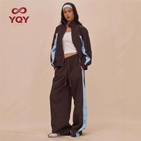 Ensemble tendance décontracté pour femme : veste zippée à rayures color block et pantalon à lacets