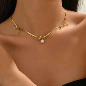 Collar con lazo de estilo europeo americano con colgante de perla y cadena de serpiente para mujer, joyería de aleación de zinc para uso diario y fiestas - Product Image 1