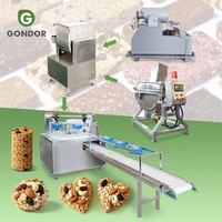 Ensemble complet de fruits dattiers formant des bonbons Machine à maler rotative pour barre de céréales nougat caramel et protéines en Inde