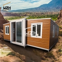 Maison conteneur de luxe extensible de 40 pieds, étanche, design moderne, préfabriquée à double aile, pour logements annexes