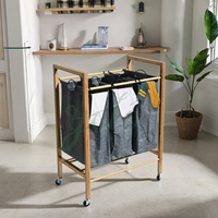 Vente en gros de tissu de bambou pliable Grand panier à linge à roulettes Panier de rangement amovible pour vêtements sales Tissu pour le salon
