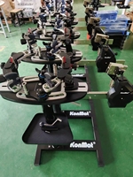 Machine à chaîne manuelle à support réglable, pour raquettes de tennis et de badminton à usage personnel avec une manipulation facile